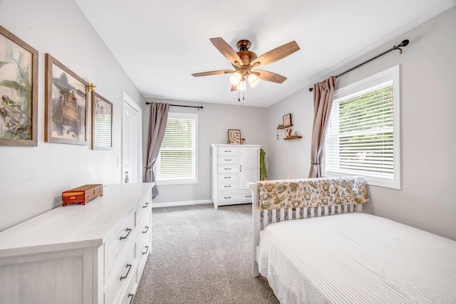 54727 Twin Lakes Rd, Dowagiac, MI 49047 - bedroom with light carpet and a ceiling fan
