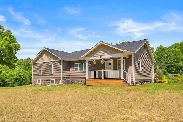 54727 Twin Lakes Rd, Dowagiac, MI 49047 - back of property with covered porch and a lawn