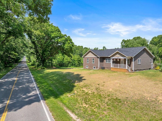 54727 Twin Lakes Rd, Dowagiac, MI 49047 - single story home with a front yard, a porch, and roof with shingles