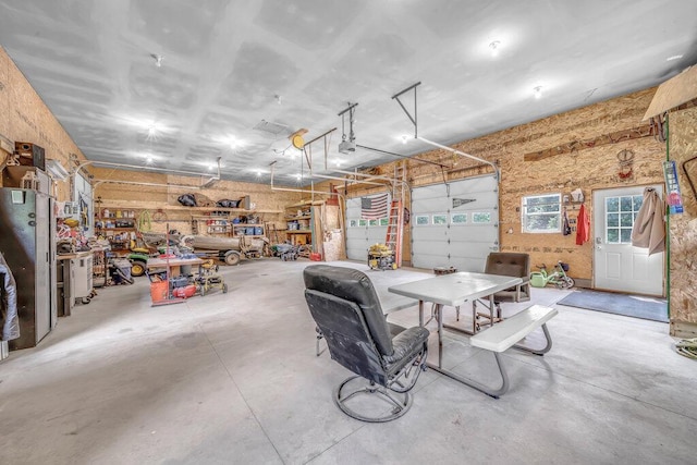54727 Twin Lakes Rd, Dowagiac, MI 49047 - garage featuring a workshop area