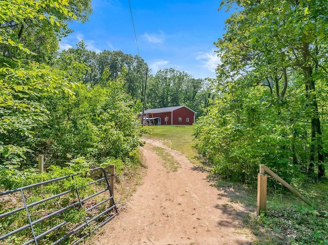 54727 Twin Lakes Rd, Dowagiac, MI 49047 - view of yard featuring dirt driveway and an outdoor structure