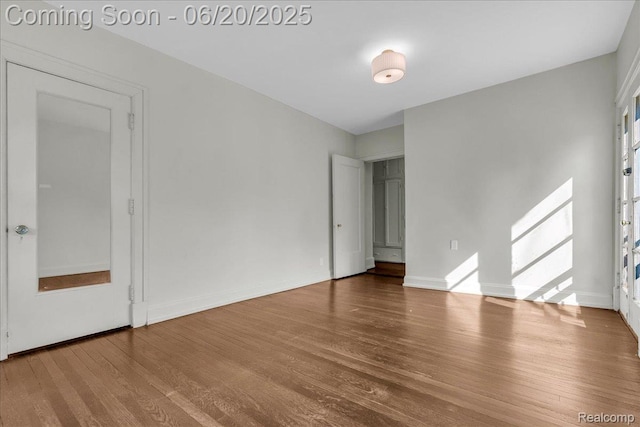 1710 Seminole St, Detroit, MI 48214 - empty room featuring wood finished floors and healthy amount of natural light