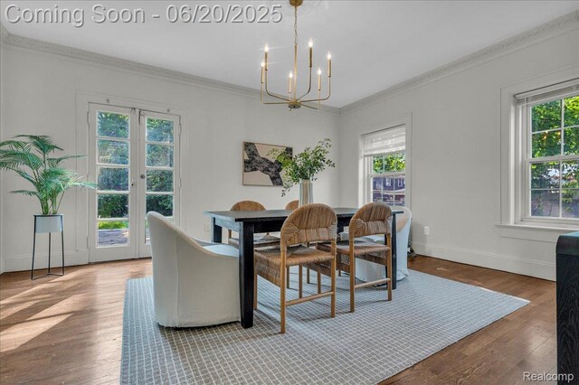 1710 Seminole St, Detroit, MI 48214 - dining space with a chandelier, ornamental molding, and wood finished floors