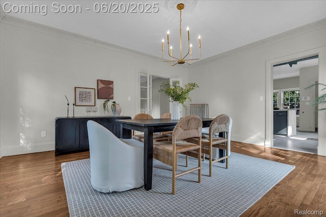 1710 Seminole St, Detroit, MI 48214 - dining room featuring a chandelier, wood finished floors, and ornamental molding