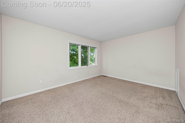 5805 Dawn Ridge Dr, Troy, MI 48098 - carpeted empty room featuring baseboards