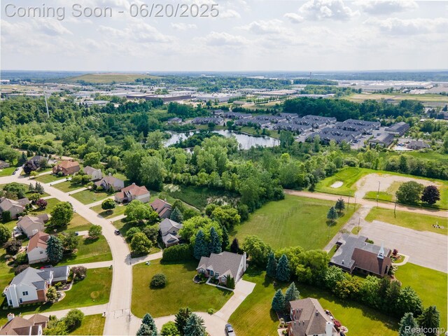 4096 Villager Dr, Lake Orion, MI 48359 - aerial view of residential area with a nearby body of water