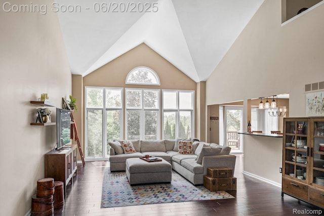 4096 Villager Dr, Lake Orion, MI 48359 - living room with a chandelier, dark wood finished floors, and vaulted ceiling