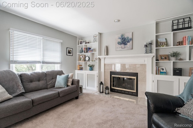4096 Villager Dr, Lake Orion, MI 48359 - living room with carpet flooring, a tiled fireplace, and built in features