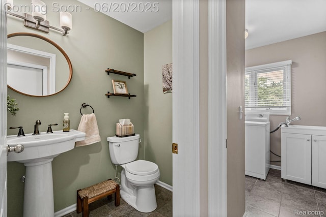 4096 Villager Dr, Lake Orion, MI 48359 - bathroom featuring tile patterned floors and washer / clothes dryer