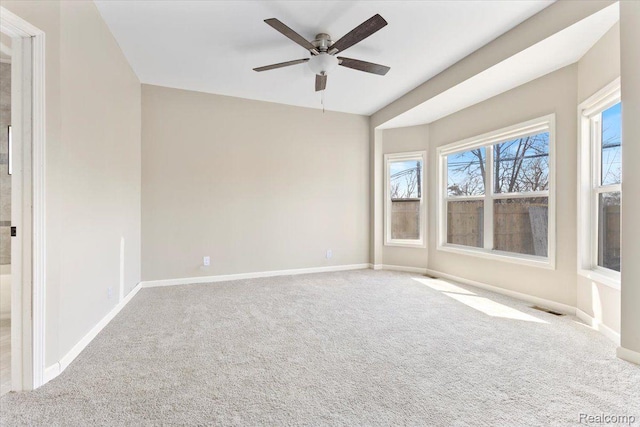 2553 Marlborough St, Detroit, MI 48215 - carpeted empty room with baseboards and a ceiling fan