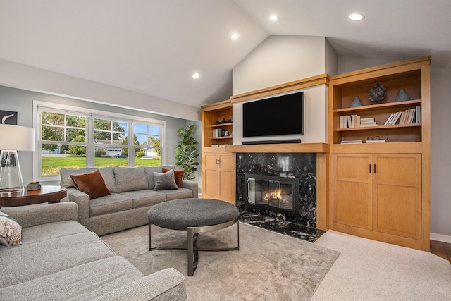 2069 Watermark Dr SE, Grand Rapids, MI 49546 - living room with a premium fireplace, recessed lighting, and high vaulted ceiling