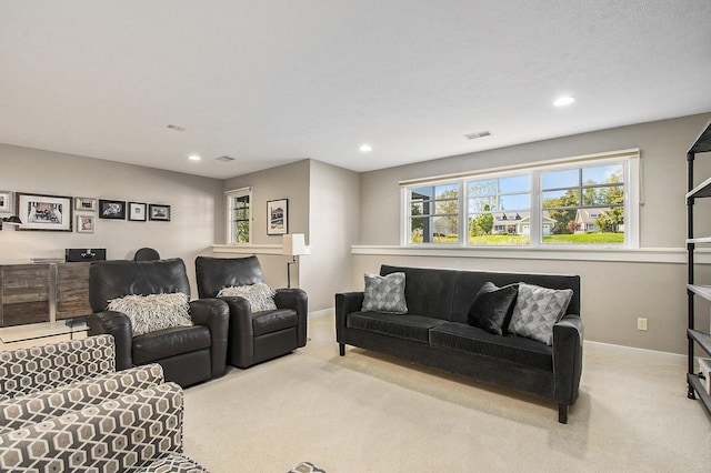 2069 Watermark Dr SE, Grand Rapids, MI 49546 - carpeted living room with healthy amount of natural light and recessed lighting
