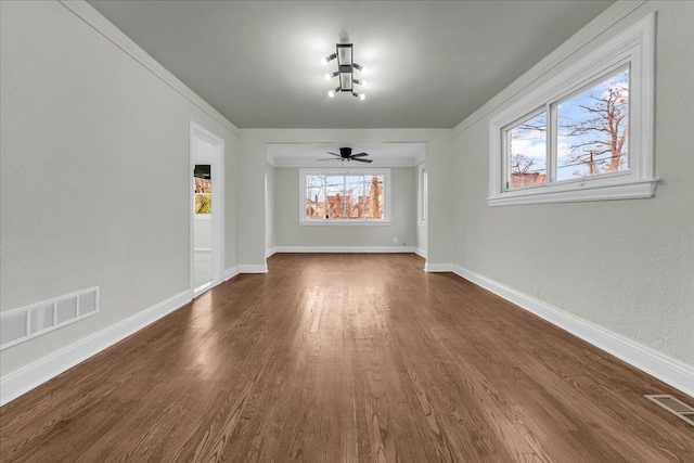 16241 Cherrylawn St, Detroit, MI 48221 - unfurnished dining area with dark wood-type flooring and a ceiling fan