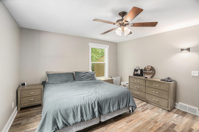 8577 Loveless Dr, Howard City, MI 49329 - bedroom featuring light wood-type flooring and ceiling fan