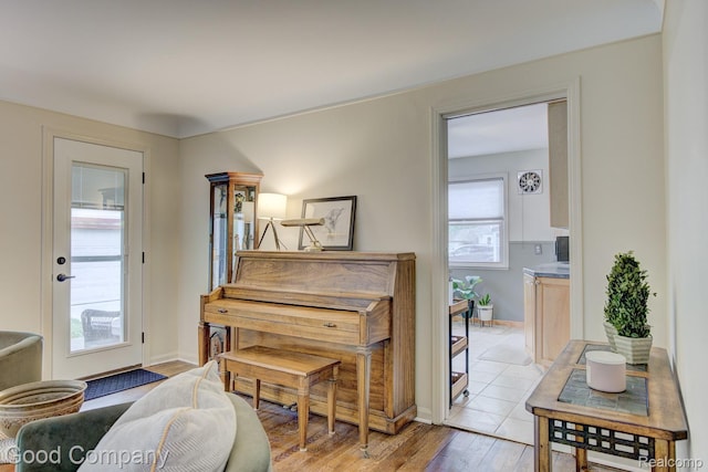 1012 W 12 Mile Rd, Royal Oak, MI 48073 - living room featuring light wood finished floors and baseboards