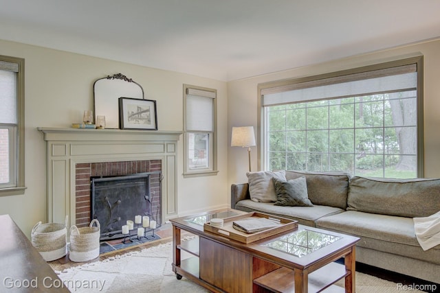 1012 W 12 Mile Rd, Royal Oak, MI 48073 - living room featuring healthy amount of natural light and a fireplace