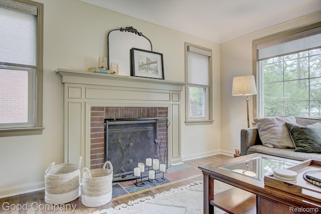 1012 W 12 Mile Rd, Royal Oak, MI 48073 - living area with wood finished floors and a fireplace