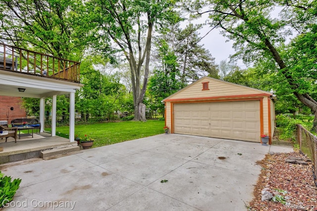 1012 W 12 Mile Rd, Royal Oak, MI 48073 - detached garage with view of scattered trees