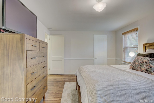 1012 W 12 Mile Rd, Royal Oak, MI 48073 - bedroom featuring wood finished floors and baseboards