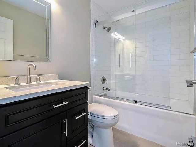 1050 Wall St Unit 2E, Ann Arbor, MI 48105 - bathroom with vanity and enclosed tub / shower combo
