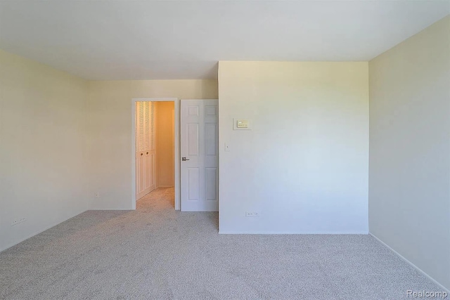 1050 Wall St Unit 2E, Ann Arbor, MI 48105 - empty room featuring light colored carpet