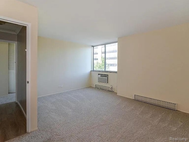 1050 Wall St Unit 2E, Ann Arbor, MI 48105 - carpeted spare room with a wall mounted AC
