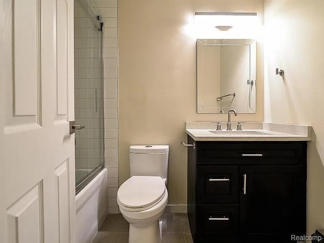 1050 Wall St Unit 2E, Ann Arbor, MI 48105 - full bath featuring vanity, bathtub / shower combination, and tile patterned flooring
