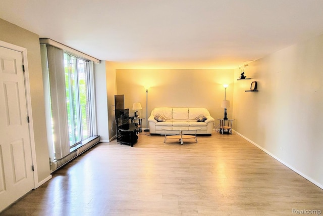 1050 Wall St Unit 2E, Ann Arbor, MI 48105 - living area featuring healthy amount of natural light and wood finished floors