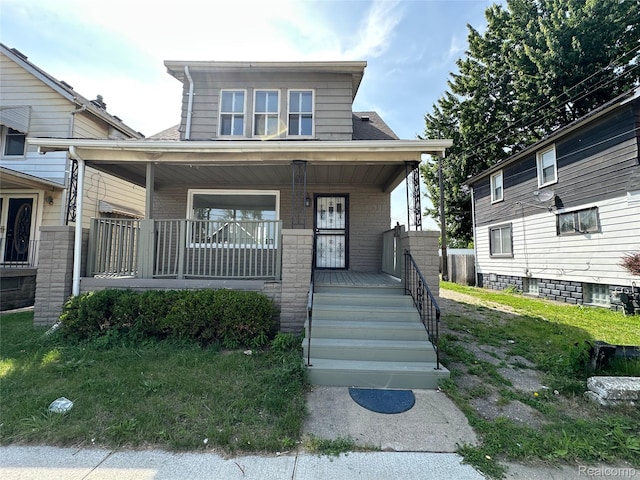4222 High St, Ecorse, MI 48229 - view of front of home with covered porch and brick siding