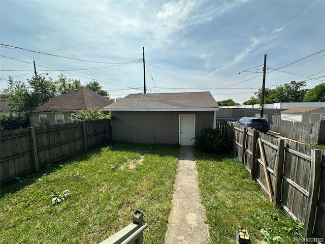 4222 High St, Ecorse, MI 48229 - fenced backyard featuring an outbuilding