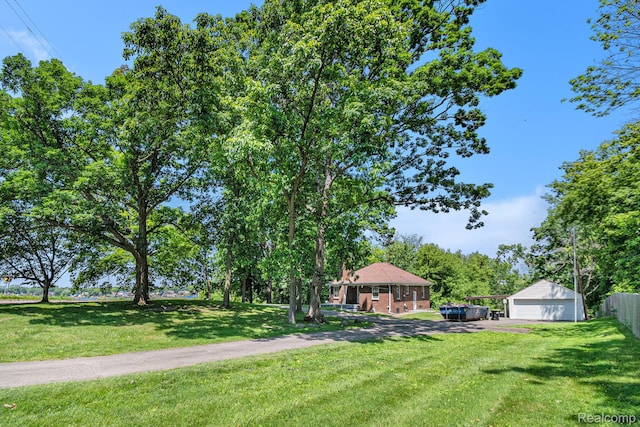 3382 W Silver Lake Rd, Fenton, MI 48430 - view of yard featuring a detached garage