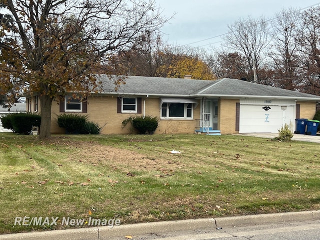 1910 Weiss St, Saginaw, MI 48602 - ranch-style home featuring brick siding, a garage, and a front yard
