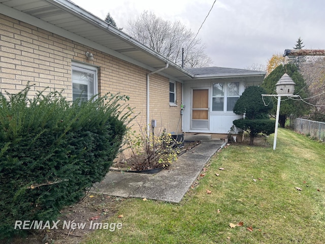 1910 Weiss St, Saginaw, MI 48602 - property entrance with brick siding