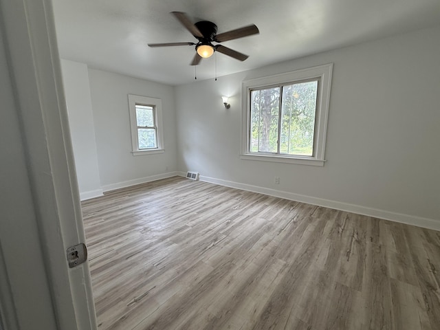 2427 Highland St, Detroit, MI 48206 - empty room featuring wood finished floors and a ceiling fan