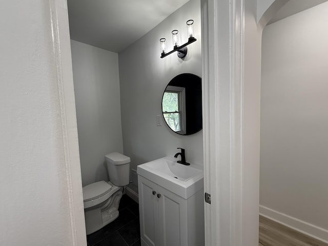 2427 Highland St, Detroit, MI 48206 - bathroom with vanity and toilet