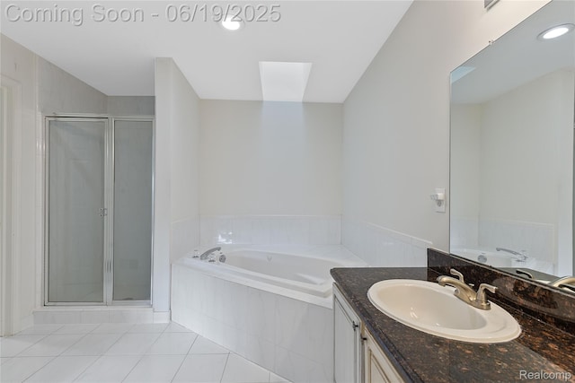 7382 Gateway Dr, West Bloomfield, MI 48322 - bathroom featuring tile patterned floors, vanity, a garden tub, a stall shower, and recessed lighting