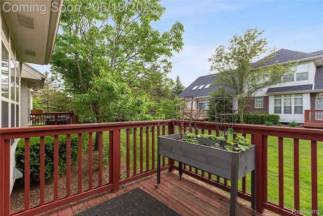 7382 Gateway Dr, West Bloomfield, MI 48322 - wooden terrace with a lawn