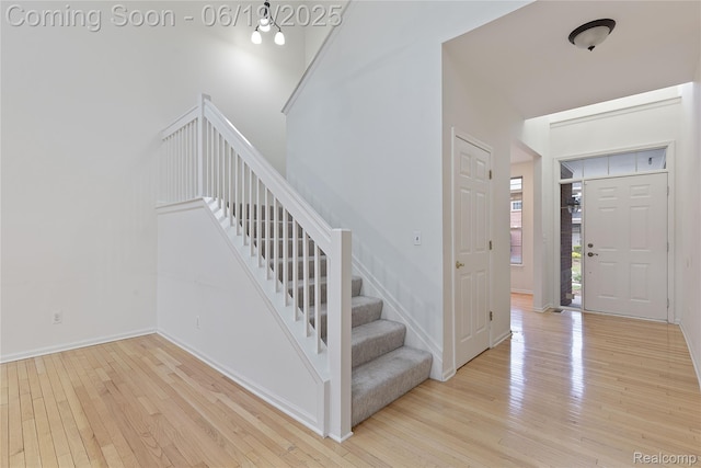 7382 Gateway Dr, West Bloomfield, MI 48322 - entrance foyer featuring hardwood / wood-style flooring and stairway