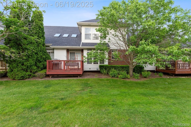 7382 Gateway Dr, West Bloomfield, MI 48322 - rear view of property with a wooden deck, a yard, and a shingled roof