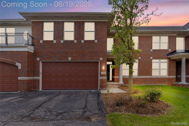 7382 Gateway Dr, West Bloomfield, MI 48322 - multi unit property featuring brick siding, driveway, and a garage