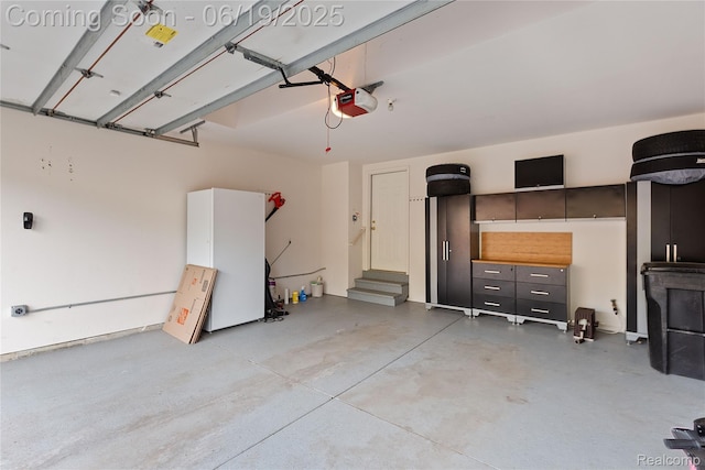 7382 Gateway Dr, West Bloomfield, MI 48322 - garage featuring a garage door opener