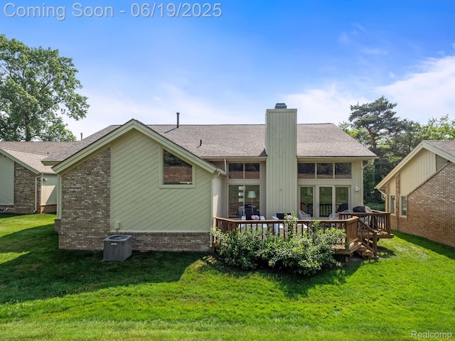 6420 Apple Grove Ln, Bloomfield Hills, MI 48301 - rear view of property featuring a chimney, a deck, a lawn, and brick siding