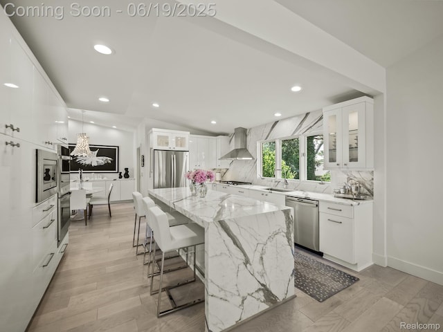 6420 Apple Grove Ln, Bloomfield Hills, MI 48301 - kitchen with appliances with stainless steel finishes, wall chimney range hood, backsplash, light stone countertops, and glass insert cabinets