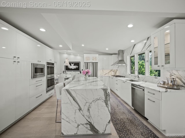 6420 Apple Grove Ln, Bloomfield Hills, MI 48301 - kitchen featuring stainless steel appliances, wall chimney range hood, backsplash, white cabinets, and modern cabinets