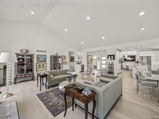 6420 Apple Grove Ln, Bloomfield Hills, MI 48301 - living area featuring light wood-style floors, recessed lighting, and high vaulted ceiling