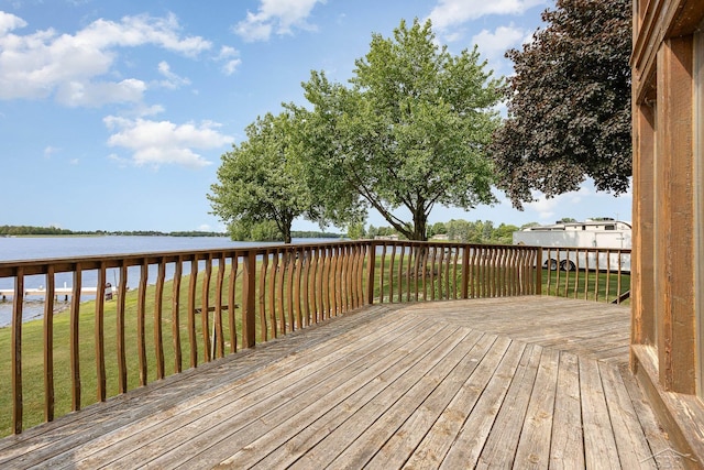 1653 Manchester Way, Gladwin, MI 48624 - wooden deck with a water view and a lawn