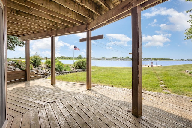 1653 Manchester Way, Gladwin, MI 48624 - wooden terrace featuring a water view and a lawn