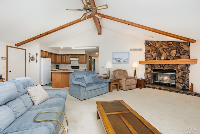 1653 Manchester Way, Gladwin, MI 48624 - living area featuring light carpet, ceiling fan, and a stone fireplace
