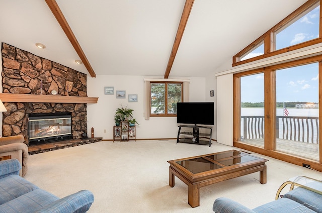 1653 Manchester Way, Gladwin, MI 48624 - living area featuring carpet flooring and a stone fireplace
