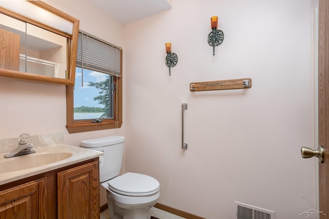 1653 Manchester Way, Gladwin, MI 48624 - bathroom with toilet and vanity